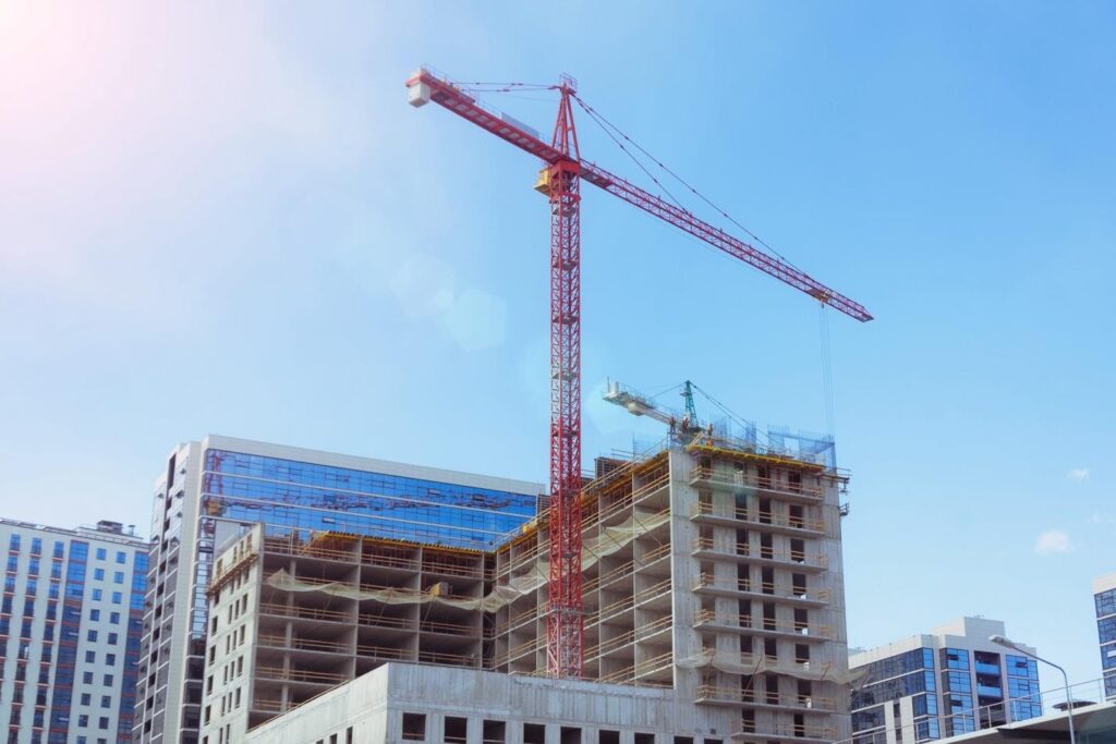 Crane constructing a commercial building
