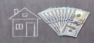 Chalk Outline of a House With $100 Bills