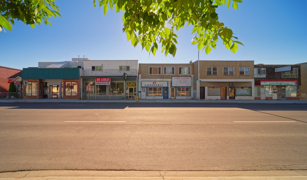 Downtown street with connected shopping units and other businesses
